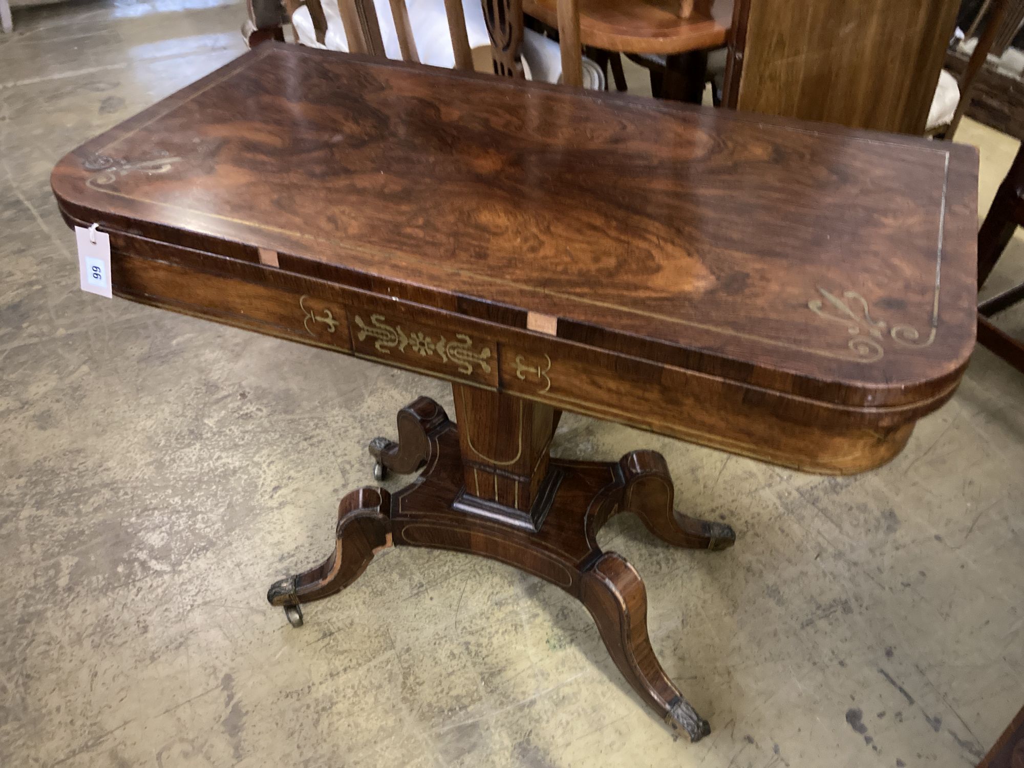 A Regency brass inlaid rosewood folding card table, width 91cm, depth 45cm, height 74cm